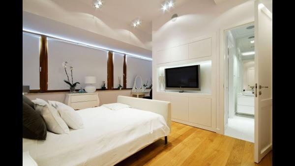 Pros and Cons of a TV in the Bedroom